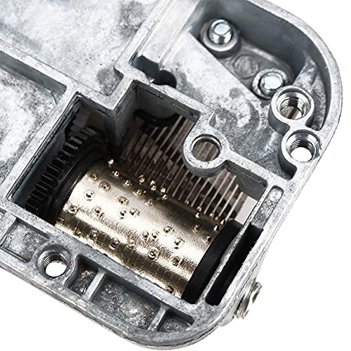 verzilverde muziekdelen met schroevendraaier muziekdoos (zwaan zee)